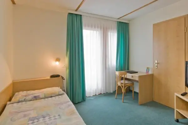 Chambre simple Hôtel Olympica Brig-Glis