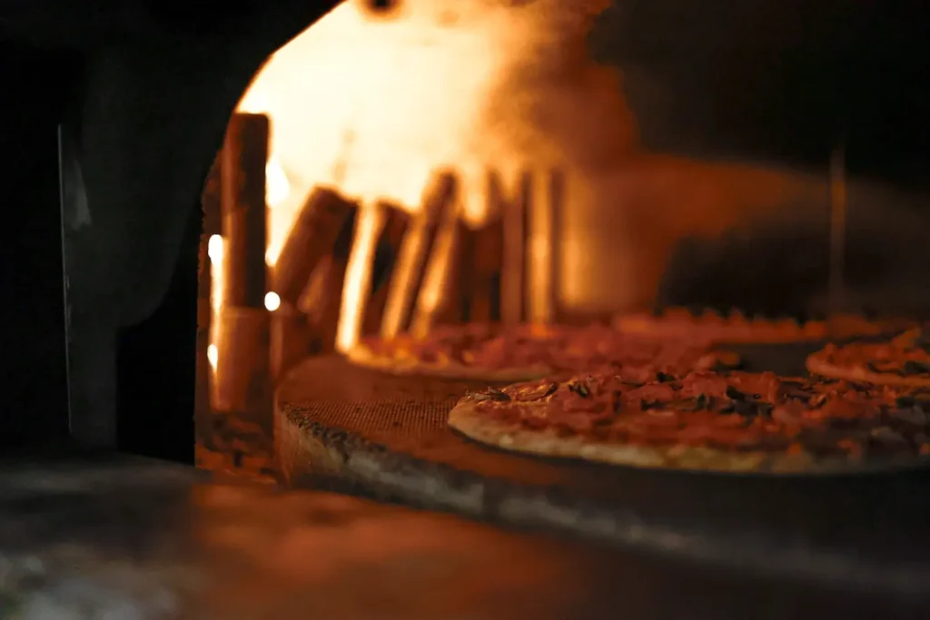 Pizza al horno de leña en el restaurante Olympica de Brig-Glis